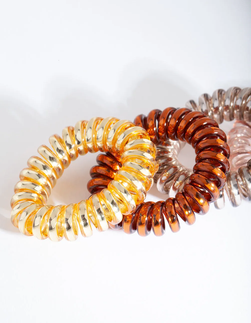 Plastic Rust & Mustard Spiral Hair Ties 4-Pack