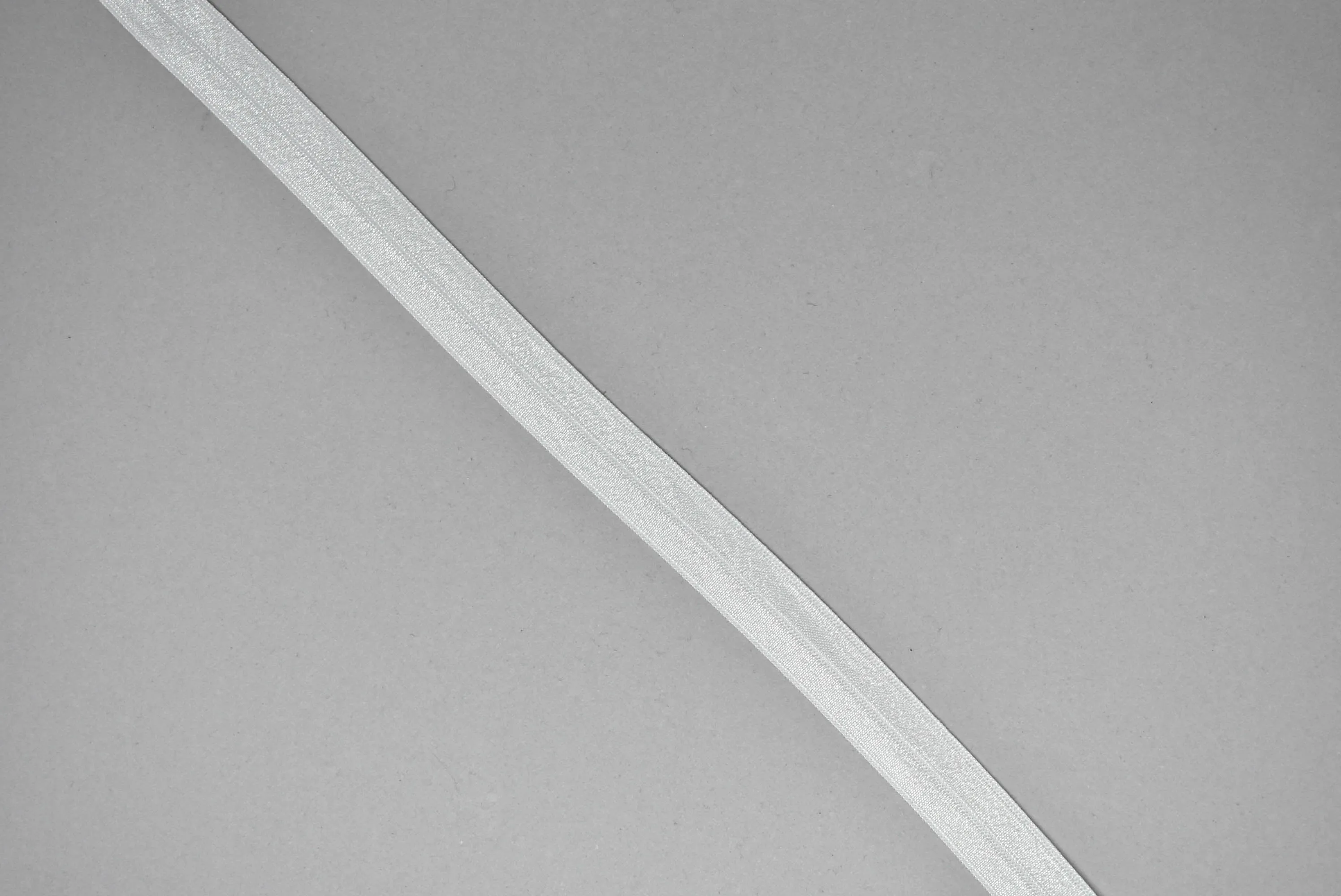 White Fold-Over Elastic (FOE) Trim